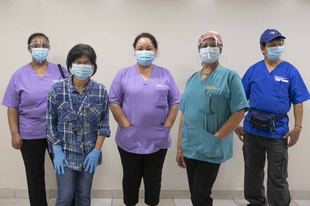 PSWs (from left to right) Frehiwot Abreham , Eva Boongaling, Hema Tamang , Beverly Moreau and Wangdue Tsering are photographed at West Neighbourhood House in Toronto on Monday November 9, 2020. Photo: West Neighbourhood House/Chris Young